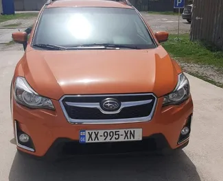 Frontvisning af en udlejnings Subaru Crosstrek i Tbilisi, Georgien ✓ Bil #4450. ✓ Automatisk TM ✓ 0 anmeldelser.