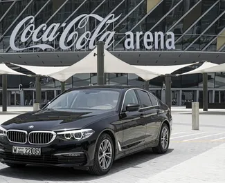 Front view of a rental BMW 520i in Dubai, UAE ✓ Car #4928. ✓ Automatic TM ✓ 0 reviews.