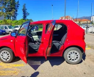 Vooraanzicht van een huurauto Suzuki Ignis in Budva, Montenegro ✓ Auto #4403. ✓ Transmissie Handmatig TM ✓ 0 beoordelingen.