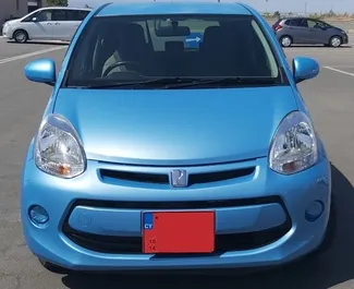 Front view of a rental Toyota Passo at Paphos Airport, Cyprus ✓ Car #5019. ✓ Automatic TM ✓ 0 reviews.