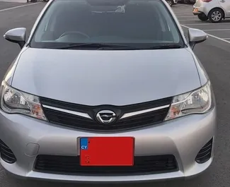 Nomas automašīnas priekšskats Toyota Corolla Fielder Pafosas lidostā, Kipra ✓ Automašīna #5025. ✓ Pārnesumu kārba Rokasgrāmata TM ✓ Atsauksmes 0.