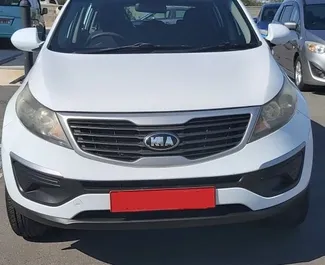 Front view of a rental Kia Sportage at Paphos Airport, Cyprus ✓ Car #5028. ✓ Automatic TM ✓ 0 reviews.