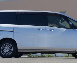 Car Hire Nissan Serena #5030 Automatic at Paphos Airport, equipped with 2.0L engine ➤ From Charalambos in Cyprus.