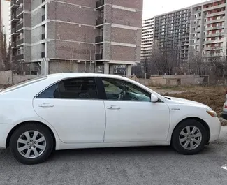 Toyota Camry 2007 car hire in Georgia, featuring ✓ Hybrid fuel and 150 horsepower ➤ Starting from 105 GEL per day.