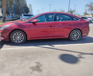 Front view of a rental Hyundai Sonata in Abu Dhabi, UAE ✓ Car #5535. ✓ Automatic TM ✓ 1 reviews.