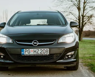 Front view of a rental Opel Astra SW in Podgorica, Montenegro ✓ Car #4621. ✓ Manual TM ✓ 4 reviews.
