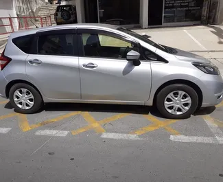 واجهة أمامية لسيارة إيجار Nissan Note في في ليماسول, قبرص ✓ رقم السيارة 5594. ✓ ناقل حركة أوتوماتيكي ✓ تقييمات 0.