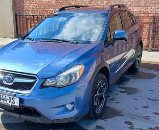 Vista frontal de um aluguel Subaru Crosstrek em Tbilisi, Geórgia ✓ Carro #5730. ✓ Transmissão Automático TM ✓ 2 avaliações.