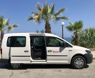 Front view of a rental Volkswagen Caddy Maxi in Crete, Greece ✓ Car #5579. ✓ Manual TM ✓ 0 reviews.