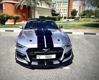 Ford Mustang Cabrio 2020 car hire in the UAE, featuring ✓ Petrol fuel and 320 horsepower ➤ Starting from 210 AED per day.