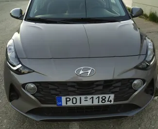 Front view of a rental Hyundai i10 on Rhodes, Greece ✓ Car #5799. ✓ Automatic TM ✓ 0 reviews.