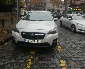 Frontvisning av en leiebil Subaru Crosstrek i Tbilisi, Georgia ✓ Bil #6263. ✓ Automatisk TM ✓ 0 anmeldelser.