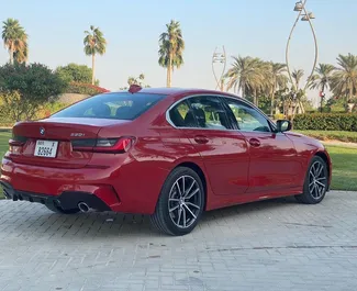BMW 330i 2021 available for rent in Dubai, with 250 km/day mileage limit.