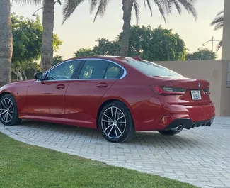 Biluthyrning av BMW 330i 2021 i i Förenade Arabemiraten, med funktioner som ✓ Bensin bränsle och 300 hästkrafter ➤ Från 450 AED per dag.