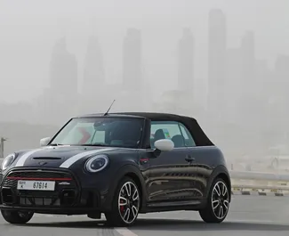 Mini John Cooper Works Convertible 2022 car hire in the UAE, featuring ✓ Petrol fuel and 220 horsepower ➤ Starting from 520 AED per day.