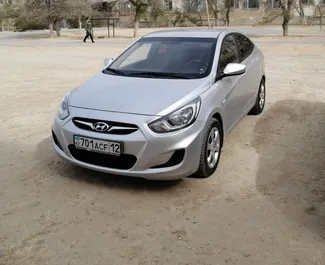 Frontvisning av en leiebil Hyundai Solaris i Aktau, Kasakhstan ✓ Bil #6271. ✓ Automatisk TM ✓ 0 anmeldelser.