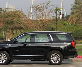 GMC Yukon 2022 car hire in the UAE, featuring ✓ Petrol fuel and 400 horsepower ➤ Starting from 740 AED per day.