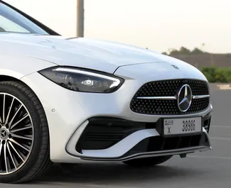 Aluguel de carro Mercedes-Benz C200 2023 nos Emirados Árabes Unidos, com ✓ combustível Gasolina e 350 cavalos de potência ➤ A partir de 670 AED por dia.