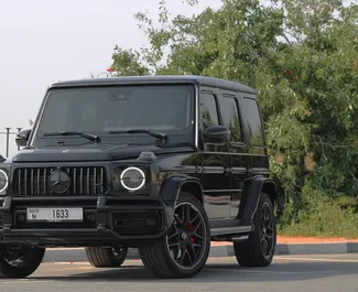 Vista frontal de um aluguel Mercedes-Benz G63 AMG no Dubai, Emirados Árabes Unidos ✓ Carro #6164. ✓ Transmissão Automático TM ✓ 0 avaliações.