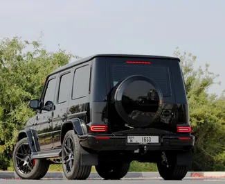 Mercedes-Benz G63 AMG 2023 car hire in the UAE, featuring ✓ Petrol fuel and 670 horsepower ➤ Starting from 2300 AED per day.