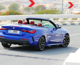 BMW 420i Cabrio 2023 car hire in the UAE, featuring ✓ Petrol fuel and 350 horsepower ➤ Starting from 700 AED per day.
