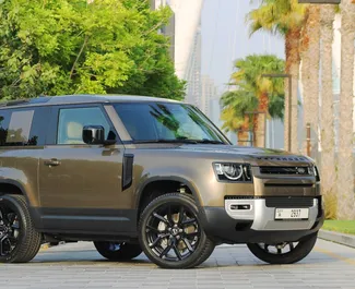 Front view of a rental Land Rover Defender in Dubai, UAE ✓ Car #5999. ✓ Automatic TM ✓ 0 reviews.