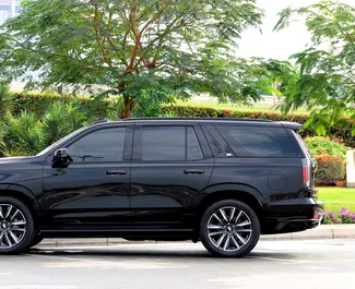 Cadillac Escalade 2023 car hire in the UAE, featuring ✓ Petrol fuel and 600 horsepower ➤ Starting from 1450 AED per day.