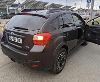 Subaru Crosstrek 2014 available for rent in Tbilisi, with unlimited mileage limit.