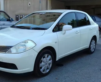 Bilutleie av Nissan Tiida 2015 i på Kypros, inkluderer ✓ Bensin drivstoff og  hestekrefter ➤ Starter fra 27 EUR per dag.