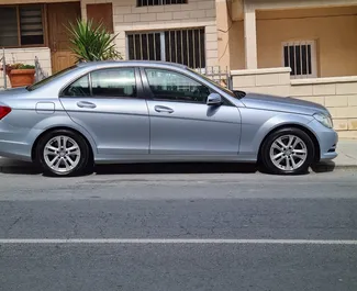 Mercedes-Benz C-Class 2014 tilgængelig til leje i Limassol, med ubegrænset kilometertæller grænse.