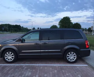 Interior of Chrysler Town & Country for hire in Belarus. A Great 7-seater car with a Automatic transmission.