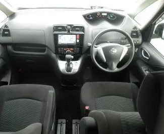 Frontvisning av en leiebil Nissan Serena i Limassol, Kypros ✓ Bil #3966. ✓ Automatisk TM ✓ 1 anmeldelser.