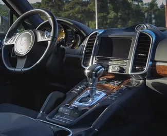 Interior of Porsche Cayenne Turbo for hire in Georgia. A Great 5-seater car with a Automatic transmission.