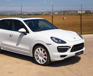 Front view of a rental Porsche Cayenne in Tbilisi, Georgia ✓ Car #6290. ✓ Automatic TM ✓ 0 reviews.