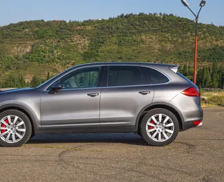 Porsche Cayenne Turbo 2011 car hire in Georgia, featuring ✓ Petrol fuel and 500 horsepower ➤ Starting from 320 GEL per day.