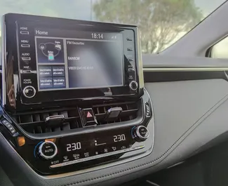 Interior of Toyota Corolla for hire in Greece. A Great 5-seater car with a Automatic transmission.