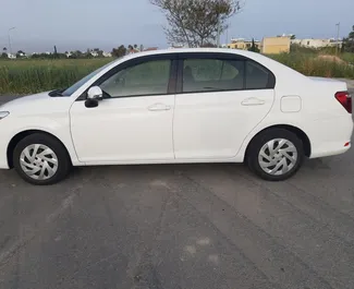 Priekinė automobilio, kurį nuomojate Toyota Corolla Axio Larnakoje, Kipras vaizdas ✓ Automobilis #6514. ✓ Pavarų dėžė Automatinis TM ✓ Atsiliepimai 0.
