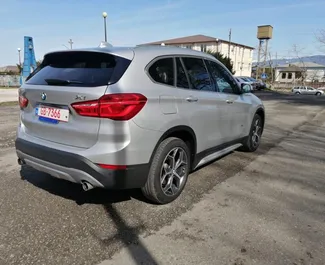 BMW X1 2020 car hire in Georgia, featuring ✓ Petrol fuel and 280 horsepower ➤ Starting from 150 GEL per day.