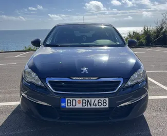 Front view of a rental Peugeot 308 in Budva, Montenegro ✓ Car #6482. ✓ Manual TM ✓ 0 reviews.