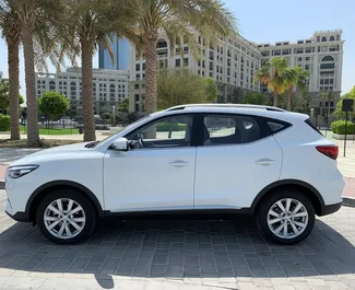 MG ZS 2023 car hire in the UAE, featuring ✓ Petrol fuel and 118 horsepower ➤ Starting from 90 AED per day.