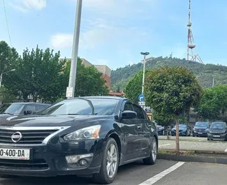 Nissan Altima 2014 disponível para alugar em Tbilisi, com limite de quilometragem de ilimitado.