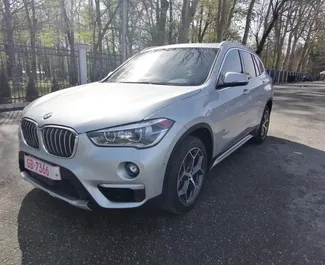 Predný pohľad na prenajaté auto BMW X1 v v Tbilisi, Georgia ✓ Auto č. 6637. ✓ Prevodovka Automatické TM ✓ Hodnotenia 4.