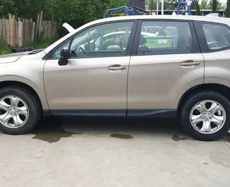 Subaru Forester 2015 disponível para alugar em Tbilisi, com limite de quilometragem de ilimitado.