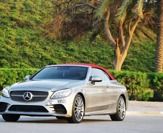 Mercedes-Benz C300 Cabrio 2020 car hire in the UAE, featuring ✓ Petrol fuel and 255 horsepower ➤ Starting from 580 AED per day.