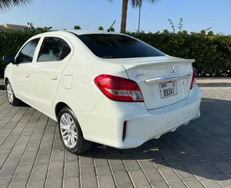 Mitsubishi Attrage udlejning. Økonomi Bil til udlejning i De Forenede Arabiske Emirater ✓ Depositum på 1500 AED ✓ TPL, SCDW, Passagerer, Tyveri forsikringsmuligheder.
