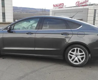 Арендуйте Ford Fusion Sedan 2014 в Грузии. Топливо: Бензин. Мощность: 175 л.с. ➤ Стоимость от 65 GEL в сутки.