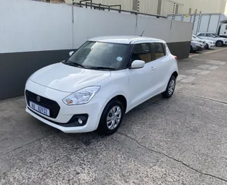 Front view of a rental Suzuki Swift in Ayia Napa, Cyprus ✓ Car #6465. ✓ Automatic TM ✓ 0 reviews.