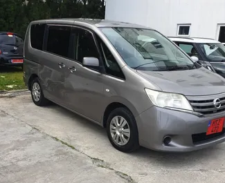 Front view of a rental Nissan Serena in Larnaca, Cyprus ✓ Car #3996. ✓ Automatic TM ✓ 0 reviews.