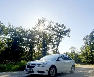 Front view of a rental Chevrolet Cruze in Kutaisi, Georgia ✓ Car #5582. ✓ Automatic TM ✓ 7 reviews.