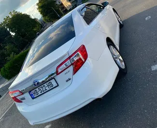 Hybrid 2.5L engine of Toyota Camry 2014 for rental in Kutaisi.